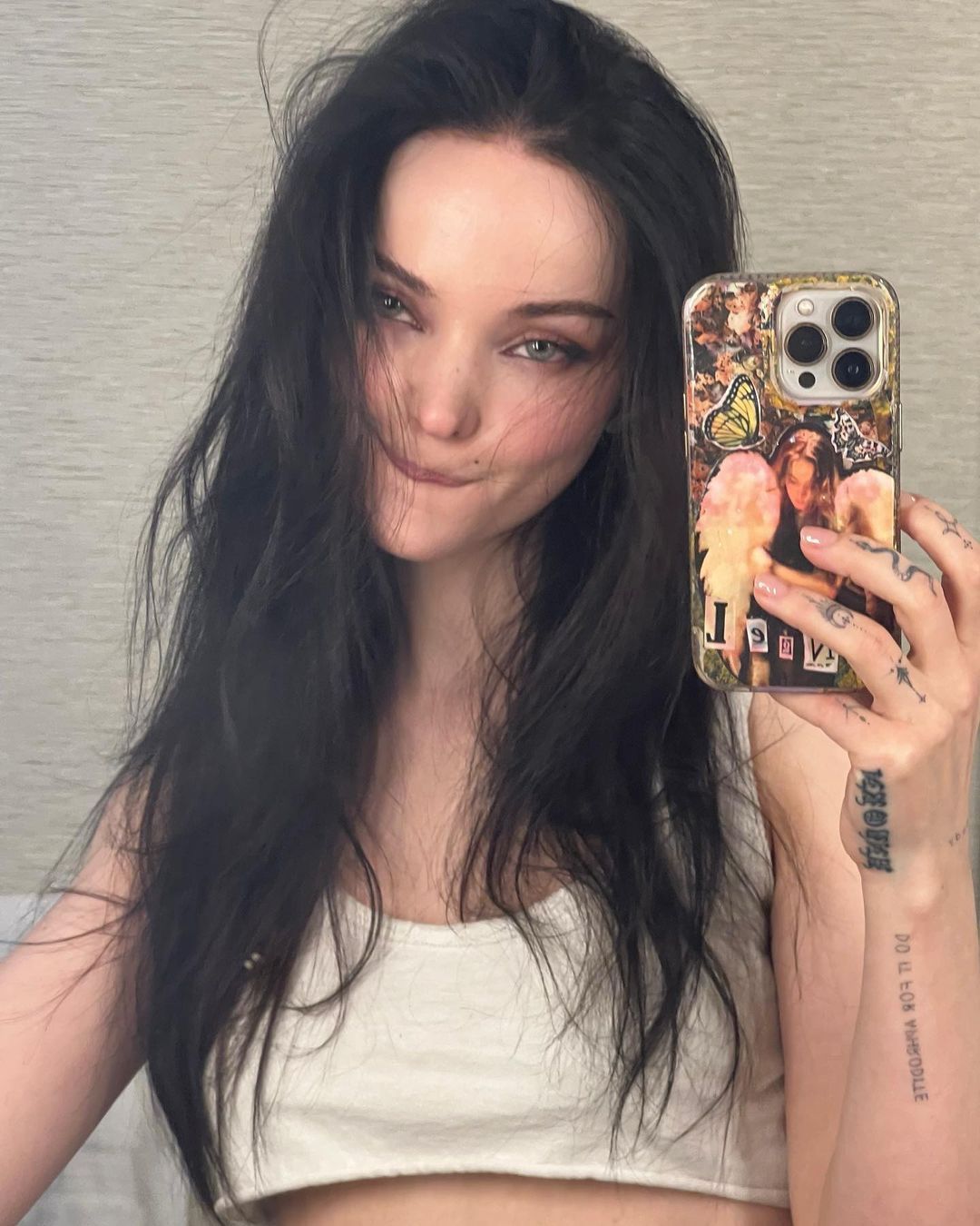 @dovecameron