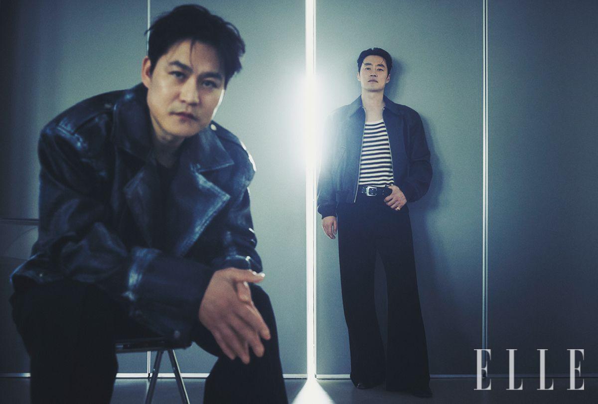 김성균이 입은 재킷과 팬츠는 모두 스타일 리스트 소장품. 이희준이 입은 레더 재킷은 Recto. 팬츠는 Stu Office. 슈즈는 Christian Louboutin. 링으로 활용한 이어 커프는 Portrait Report. 스트라이프 패턴의 슬리브리스와 벨트는 모두 스타일리스트 소장품.