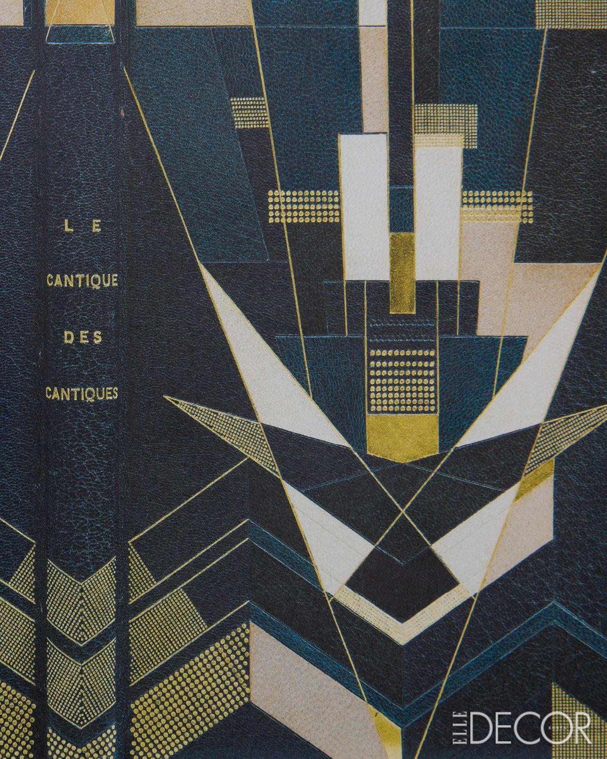 르그랭이 제본한 <Le Cantique des Cantiques>. 깊은 남색 가죽 위에 금박의 기하학이 새겨졌다.
